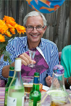 Smiling man at crayfish party, Sweden Stock Photo - Premium Royalty-Free, Code: 6102-08761304