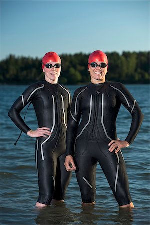 Women in wetsuit in sea, Sweden Foto de stock - Sin royalties Premium, Código: 6102-08761333