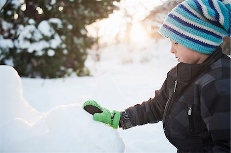 simsearch:6102-08520501,k - Boy playing at winter, Saltsjobaden, Nacka, Sweden Stock Photo - Premium Royalty-Free, Code: 6102-08761437