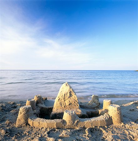 simsearch:6102-08271636,k - Sandcastel on a beach, Skane, Sweden. Foto de stock - Sin royalties Premium, Código: 6102-08768808