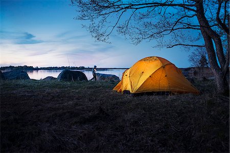 sea stockholm - Boy near tent Stock Photo - Premium Royalty-Free, Code: 6102-08726876