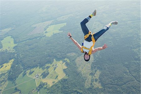 skydiving people - Woman skydiving Foto de stock - Sin royalties Premium, Código: 6102-08726893