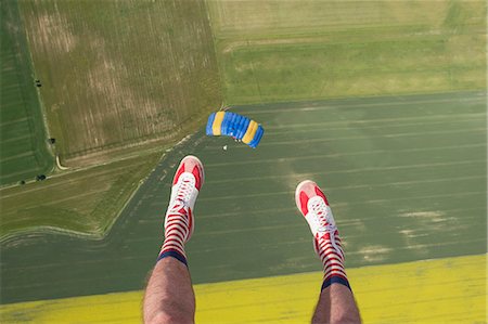 sock foot shoe - Man in air, low section Stock Photo - Premium Royalty-Free, Code: 6102-08726894