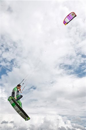 simsearch:632-06118588,k - Man kiteboarding Stock Photo - Premium Royalty-Free, Code: 6102-08726903