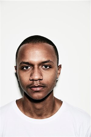 Portrait of smiling young man Stock Photo - Premium Royalty-Free, Code: 6102-08726927