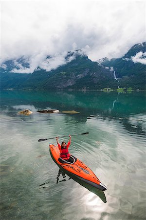 simsearch:6102-08062947,k - Woman sea kayaking Stock Photo - Premium Royalty-Free, Code: 6102-08858384