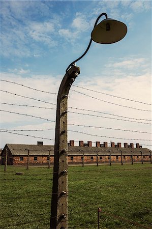 simsearch:6113-07589111,k - Concentration camp fence Stock Photo - Premium Royalty-Free, Code: 6102-08858399