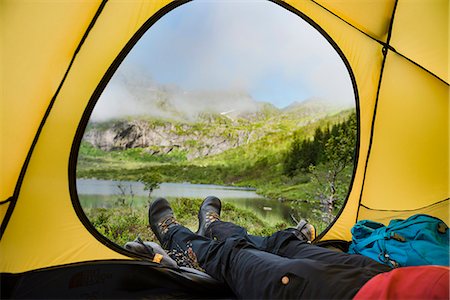 Hiker in tent Stock Photo - Premium Royalty-Free, Code: 6102-08858467