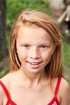 red hair preteen girl - Portrait of smiling girl Foto de stock - Sin royalties Premium, Código: 6102-08858599