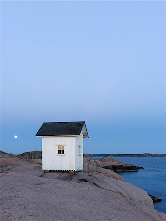 remoto (aislado) - Little house on rocks Foto de stock - Sin royalties Premium, Código: 6102-08858658