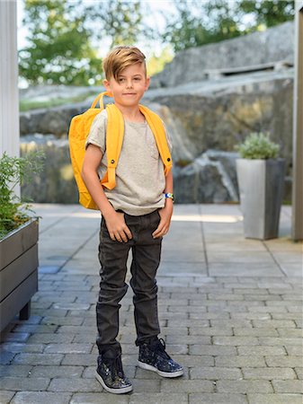 Smiling boy with backpack Stock Photo - Premium Royalty-Free, Code: 6102-08858678
