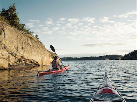 red cliff - Kayaking on lake Fotografie stock - Premium Royalty-Free, Codice: 6102-08858703