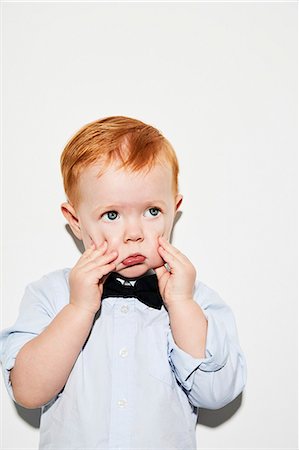 simsearch:6102-08001210,k - Portrait of toddler wearing bow tie Photographie de stock - Premium Libres de Droits, Code: 6102-08881723