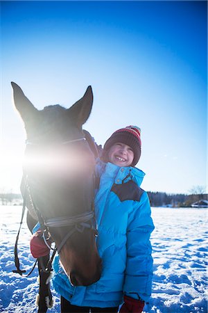 Girl with horse Stock Photo - Premium Royalty-Free, Code: 6102-08881925