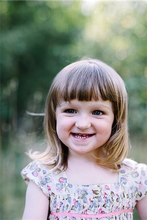 simsearch:6102-08952062,k - Portrait of smiling girl Stock Photo - Premium Royalty-Free, Code: 6102-08885274