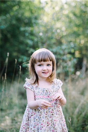 simsearch:6102-08952062,k - Portrait of girl on meadow Stock Photo - Premium Royalty-Free, Code: 6102-08885278