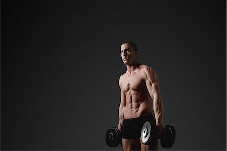 simsearch:6102-08995506,k - Man with dumbbells Stock Photo - Premium Royalty-Free, Code: 6102-08885404