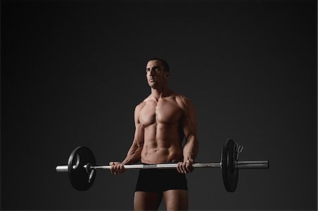simsearch:6102-08995506,k - Man with barbell Stock Photo - Premium Royalty-Free, Code: 6102-08885410