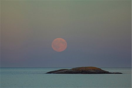 simsearch:6102-08000559,k - Full moon over rocky island Stock Photo - Premium Royalty-Free, Code: 6102-08885559