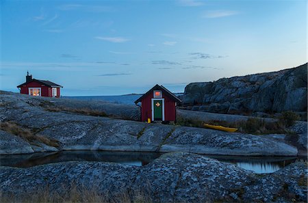 simsearch:6102-08278713,k - Wooden houses at rocky coast Stock Photo - Premium Royalty-Free, Code: 6102-08885610