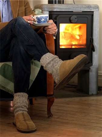 pantoufle - Man having a cup of coffee, Sweden. Photographie de stock - Premium Libres de Droits, Code: 6102-08800572