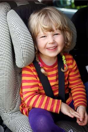 simsearch:6102-08566996,k - Child in a car seat, Sweden. Stock Photo - Premium Royalty-Free, Code: 6102-08800663