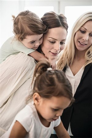 Women and girls looking down Stock Photo - Premium Royalty-Free, Code: 6102-08942236