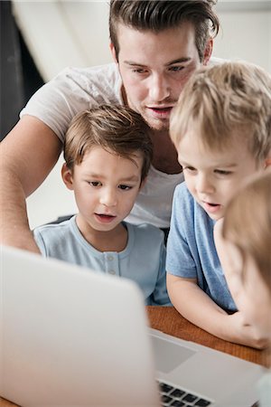 family working household together - Male preschool using laptop in preschool Stock Photo - Premium Royalty-Free, Code: 6102-08942558