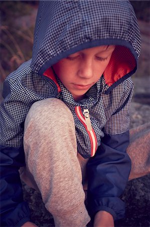 Boy looking away Stock Photo - Premium Royalty-Free, Code: 6102-08942538