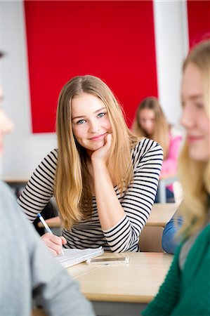 simsearch:6102-08951254,k - Portrait of teenage girl looking at camera in classroom Stock Photo - Premium Royalty-Free, Code: 6102-08951254