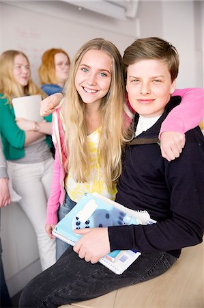 simsearch:6102-08951254,k - Portrait of smiling teenagers in classroom Stock Photo - Premium Royalty-Free, Code: 6102-08951202