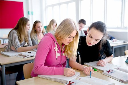 simsearch:6102-08951254,k - Teenage girls learning in classroom Stock Photo - Premium Royalty-Free, Code: 6102-08951238
