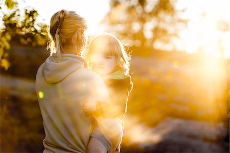 Woman holding son Stock Photo - Premium Royalty-Free, Code: 6102-08951454