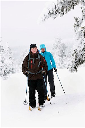 simsearch:6102-08520501,k - Couple cross country skiing in winter forest Stock Photo - Premium Royalty-Free, Code: 6102-08951415