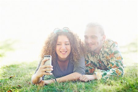 Happy couple taking selfie Stock Photo - Premium Royalty-Free, Code: 6102-08951817