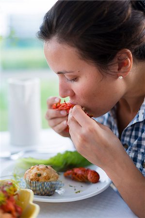 shellfish sweden - Woman eating shrimps Stock Photo - Premium Royalty-Free, Code: 6102-08951990