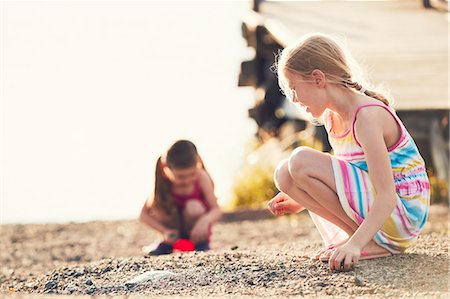 simsearch:6102-08952062,k - Girls playing in sand Stock Photo - Premium Royalty-Free, Code: 6102-08952056