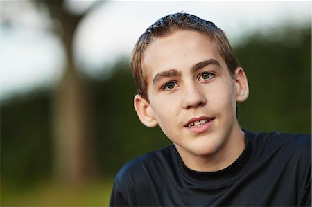 simsearch:6102-08942535,k - Portrait of teenage boy looking at camera Stock Photo - Premium Royalty-Free, Code: 6102-08952026
