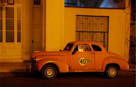 simsearch:6102-08384061,k - Vintage car in front of building at night Stock Photo - Premium Royalty-Free, Code: 6102-08952127