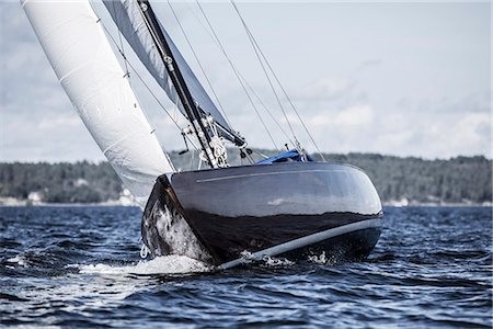 simsearch:6102-07158314,k - Sailing boat on lake Foto de stock - Sin royalties Premium, Código: 6102-08994938