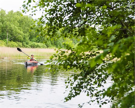 Boy kayaking Stockbilder - Premium RF Lizenzfrei, Bildnummer: 6102-08995046