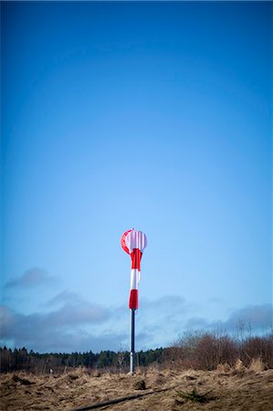 simsearch:6102-05655443,k - Windsock against blue sky Stock Photo - Premium Royalty-Free, Code: 6102-08995149