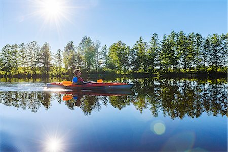 paddling water - Man kayaking Stock Photo - Premium Royalty-Free, Code: 6102-08995294