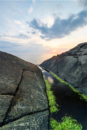 simsearch:6102-08995194,k - Rocky coast at sunset Foto de stock - Sin royalties Premium, Código: 6102-08995224