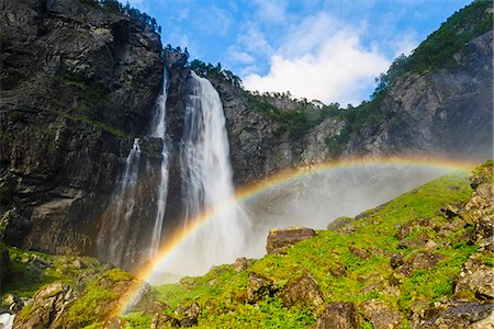Waterfall and rainbow Stock Photo - Premium Royalty-Free, Code: 6102-08995430