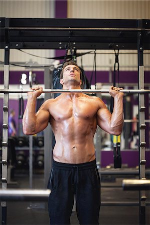 simsearch:6102-08120801,k - Man training in gym Stock Photo - Premium Royalty-Free, Code: 6102-08995500