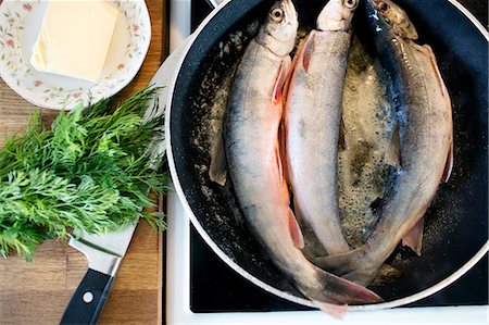 food norrbotten - Fish on frying pan Stock Photo - Premium Royalty-Free, Code: 6102-08995534