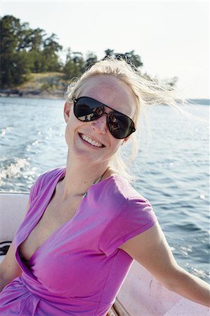 simsearch:6102-07769055,k - Portrait of woman on boat Stock Photo - Premium Royalty-Free, Code: 6102-08995601