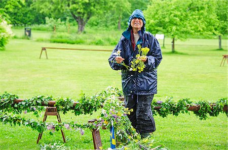 Woman preparing maypole Stock Photo - Premium Royalty-Free, Code: 6102-08996759