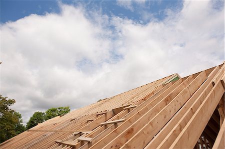 Roof rafters of a house under construction Stock Photo - Premium Royalty-Free, Code: 6105-05396216